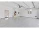 A spacious, bright garage with an epoxy floor, with ample room for storage and parking at 800 Jody Brook Ct, Las Vegas, NV 89145