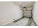 Empty garage with concrete floor at 8787 Roping Rodeo Ave # 101, Las Vegas, NV 89178