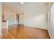 Spacious living area with wood floors and bright natural light at 8787 Roping Rodeo Ave # 101, Las Vegas, NV 89178