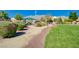 Serene community park offering walking paths, picnic area, and well-maintained landscaping for residents at 9108 Tuxpan St, Las Vegas, NV 89131