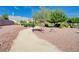 Walking path winding through the community park, surrounded by trees and native landscaping at 9108 Tuxpan St, Las Vegas, NV 89131