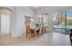 Dining room featuring a view of the backyard swimming pool through sliding glass doors at 9108 Tuxpan St, Las Vegas, NV 89131