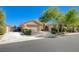 Charming single-story home featuring a well-maintained front yard and a spacious two-car garage at 9108 Tuxpan St, Las Vegas, NV 89131