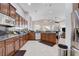 Spacious kitchen featuring stainless steel appliances, granite countertops, and ample cabinet space at 9108 Tuxpan St, Las Vegas, NV 89131