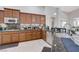 Well-equipped kitchen with granite counters, stainless steel appliances, and ample cabinet space at 9108 Tuxpan St, Las Vegas, NV 89131