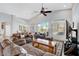 Spacious living area boasts vaulted ceilings, backyard views, and easy access to the dining room at 9108 Tuxpan St, Las Vegas, NV 89131