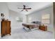 Spacious main bedroom with a ceiling fan and carpet flooring at 9108 Tuxpan St, Las Vegas, NV 89131