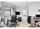 Bright home office with large window, modern furnishings, and convenient access to other living spaces at 9108 Tuxpan St, Las Vegas, NV 89131