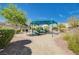 Community picnic area with a shaded pavilion, picnic tables, and a grill at 9108 Tuxpan St, Las Vegas, NV 89131