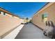 Spacious side yard with extra-wide driveway leading to a backyard gate, suitable for trailer or boat storage at 9108 Tuxpan St, Las Vegas, NV 89131