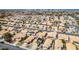 Suburban homes in a planned community, many featuring solar panels on their roofs at 938 Carnival Ave, Las Vegas, NV 89123