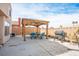 Large backyard with a covered patio area, perfect for entertaining at 938 Carnival Ave, Las Vegas, NV 89123