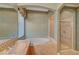 Bathroom with bathtub and glass door shower at 9485 Parkmoor Ave, Las Vegas, NV 89149