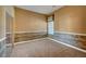 Bedroom featuring carpet flooring and window with blinds at 9485 Parkmoor Ave, Las Vegas, NV 89149