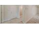 Hallway with tile floors and access to various rooms at 9485 Parkmoor Ave, Las Vegas, NV 89149