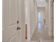 Hallway with tile floors leading to various rooms at 9485 Parkmoor Ave, Las Vegas, NV 89149