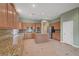 Bright kitchen with granite countertops, island and stainless steel appliances at 9485 Parkmoor Ave, Las Vegas, NV 89149