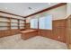 Office with custom built-ins, desk, and wainscoting at 9485 Parkmoor Ave, Las Vegas, NV 89149