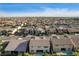 An aerial view of a residential neighborhood with mountain views at 1004 Bluebird Ridge Ct, North Las Vegas, NV 89084