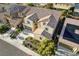 Beautiful home featuring manicured landscaping, a concrete driveway, and a tile roof at 1004 Bluebird Ridge Ct, North Las Vegas, NV 89084