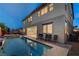 Spacious backyard featuring a sparkling pool, perfect for entertaining and enjoying sunny days at 1004 Bluebird Ridge Ct, North Las Vegas, NV 89084