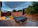 Backyard showcasing a patio dining set, pool, and jacuzzi for outdoor enjoyment at 1004 Bluebird Ridge Ct, North Las Vegas, NV 89084