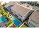 Aerial view of a private backyard featuring a pool, spa, and ample patio space for outdoor living at 1004 Bluebird Ridge Ct, North Las Vegas, NV 89084