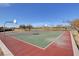 Well-maintained basketball court with multiple hoops, offering a recreational space for sports enthusiasts at 1004 Bluebird Ridge Ct, North Las Vegas, NV 89084