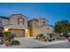 Beautiful two-story home with manicured landscaping, private drive and attached two-car garage at 1004 Bluebird Ridge Ct, North Las Vegas, NV 89084