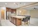 Spacious kitchen with granite countertops, stainless steel appliances, and large center island with bar seating at 1004 Bluebird Ridge Ct, North Las Vegas, NV 89084