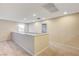 Bright loft featuring recessed lights, a ceiling fan, and access to additional rooms at 1004 Bluebird Ridge Ct, North Las Vegas, NV 89084