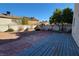 This spacious backyard features a patio and gravel landscaping at 1016 Vantage Point Rd, Las Vegas, NV 89128