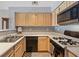 Well-lit kitchen features modern appliances, lots of countertop space, and double sink at 2040 Willowbury Dr # A, Las Vegas, NV 89108
