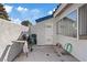 Outdoor patio area with a barbeque, storage space, and privacy wall. Ideal for grilling and outdoor activities at 2040 Willowbury Dr # A, Las Vegas, NV 89108
