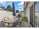 Charming patio with glass table and chairs, perfect for outdoor dining and relaxing at 2040 Willowbury Dr # A, Las Vegas, NV 89108