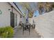 Inviting patio area with a dining table and seating, perfect for outdoor gatherings and relaxation at 2040 Willowbury Dr # A, Las Vegas, NV 89108