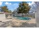 Community pool with lounge chairs and well-maintained surroundings for relaxation and recreation at 2040 Willowbury Dr # A, Las Vegas, NV 89108