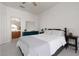 Serene bedroom with soft lighting, a double bed, and a conveniently located ensuite bathroom at 21 Ocean Harbour Ln, Las Vegas, NV 89148