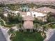 Aerial view of a community center with lush landscaping and palm trees creating a resort-like atmosphere at 21 Ocean Harbour Ln, Las Vegas, NV 89148