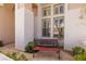 Charming front porch with bench seating perfect for relaxing and enjoying the outdoors at 21 Ocean Harbour Ln, Las Vegas, NV 89148