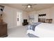 Bedroom showcases a comfortable bed, an open doorway, and built-in shelving at 21 Ocean Harbour Ln, Las Vegas, NV 89148