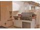 A built-in stainless steel outdoor grill and countertop on a stucco base, ready for outdoor cooking at 21 Ocean Harbour Ln, Las Vegas, NV 89148