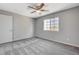 Bright bedroom with a large window providing ample natural light and gray carpeting at 220 Mission Catalina Ln # 207, Las Vegas, NV 89107