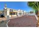 Charming home featuring a covered patio and a well-maintained backyard with desert-friendly landscaping at 2221 Loggerhead Rd, Las Vegas, NV 89117