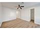 Another view of the bedroom showing hardwood floors and closet access at 2221 Loggerhead Rd, Las Vegas, NV 89117
