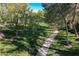 Beautifully landscaped community with mature trees and a walking path at 2221 Loggerhead Rd, Las Vegas, NV 89117
