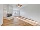 Spacious living room features a fireplace, hardwood floors, and plenty of natural light at 2221 Loggerhead Rd, Las Vegas, NV 89117