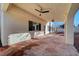 Beautiful covered patio with ceiling fans, concrete flooring, and ample space for outdoor living at 2221 Loggerhead Rd, Las Vegas, NV 89117
