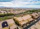 An aerial community shot featuring mountain views and desert landscaping at 2376 Via Firenze, Henderson, NV 89044