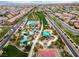 Overhead view featuring a park area with a swimming pool, playground, and walking paths within a residential neighborhood at 2376 Via Firenze, Henderson, NV 89044